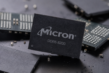 Micron DDR5 8200 memory chip displayed among semiconductor components.