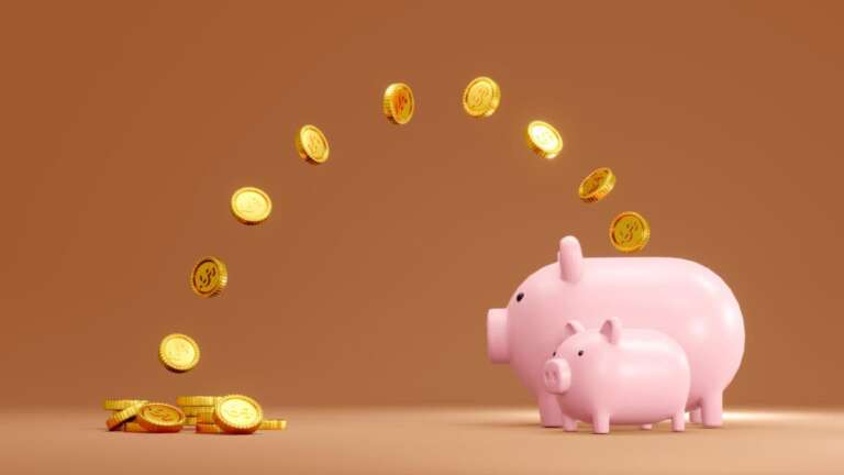 coins jump into piggy bank