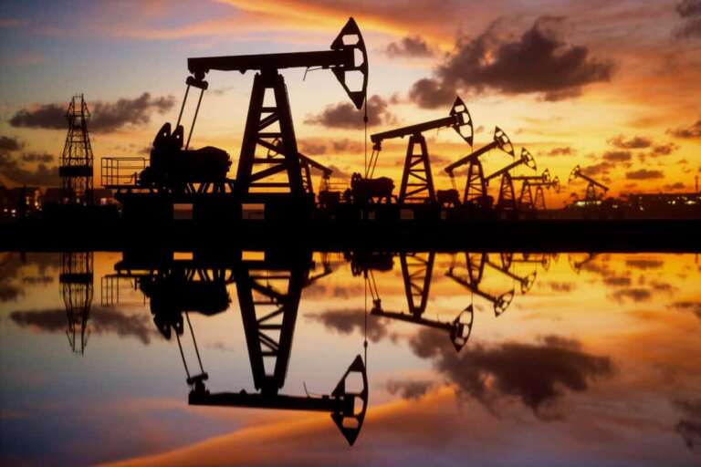 oil pumps at sunset