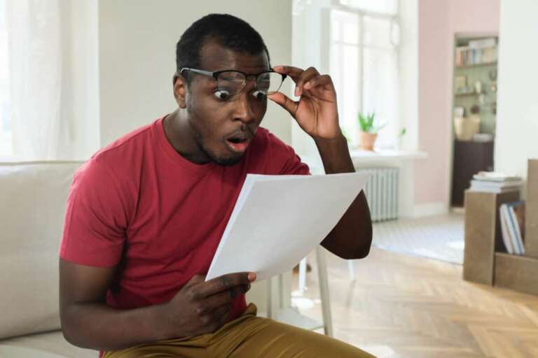 man looks surprised at investment growth