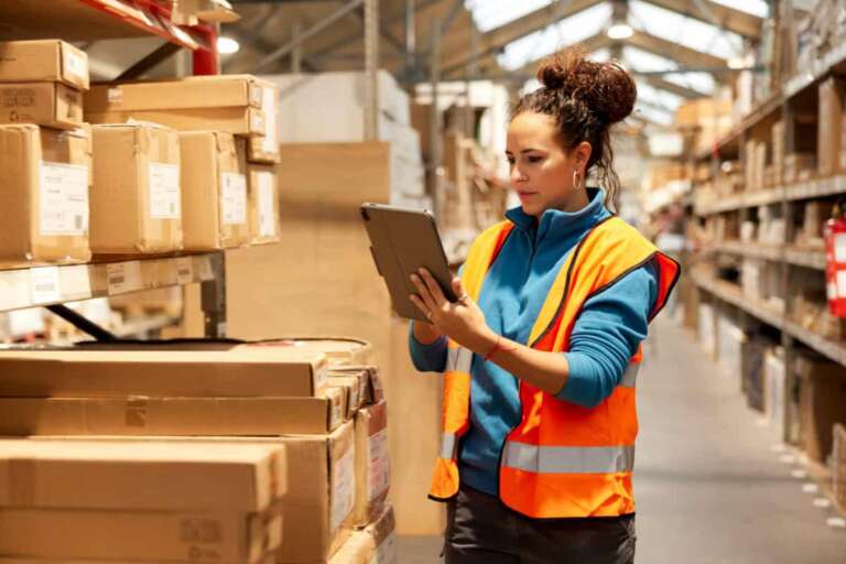 warehouse worker takes inventory in storage room